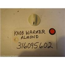 FRIGIDAIRE STOVE 316095602  Knob-warmer, Almond USED PART