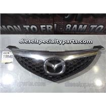 2008 2009 MAZDA 3 SEDAN 4CYL 2.0 L 5-SPEED OEM CHROME / BLACK GRILL LOGO