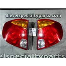 2004 2005 HYUNDAI ACCENT 1.6L ENGINE AUTO SEDAN OEM TAIL LIGHTS (SET) PAIR