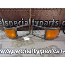 2004 2005 FORD F750 CAB CAT C7 DIESEL 6-SP SIGNAL LIGHT / HEAD LIGHT TRIM BEZELS