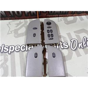 2004 - 2006 FORD F150 XLT CREWCAB WINDOW LOCK SWITCHES ( GREY ) BEZELS ( OEM )