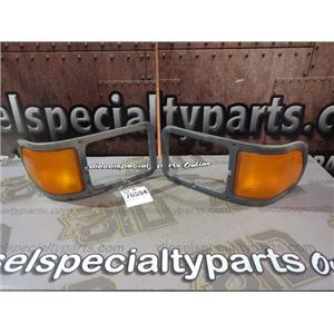 2004 2005 FORD F750 CAB CAT C7 DIESEL 6-SP SIGNAL LIGHT / HEAD LIGHT TRIM BEZELS