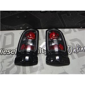 1998 - 2002 DODGE RAM 2500 REAR TAIL LIGHTS AFTER MARKET EXC CONDITION OEM